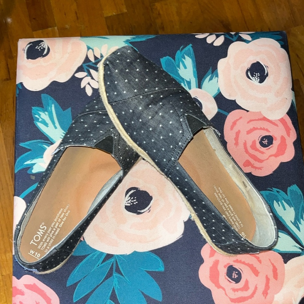 Tom’s black polka dot slip on shoes, size 10